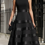 Antonella | Black sleeveless midi dress with flared skirt and defined waist