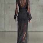 Quintina | Long black dress with deep V-neck and dramatic slit