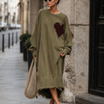 Relaxed-fit olive green sweatshirt dress with heart-shaped patch