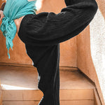 Loose wide leg trousers with leggings and sports trousers