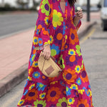 Pink babydoll dress with daisy print