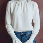 Elegant High Neck White Blouse With Smocked Cuffs And Ruffle Details