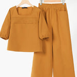 Loose solid color long sleeved top wide leg pants set