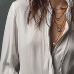White Zip-Front Blouse With Flounce Cuffs
