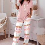 2 Pieces Outfit Letter Print Round Neck Short Sleeve Top And Tie Dye Print Elastic Waist Loose Fit Pants Set Casual Pajamas Set