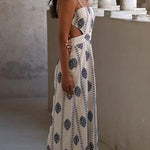 Margovil Spaghetti Strap Cut Out Waist Printed Midi Dress