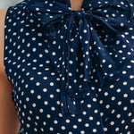 Chic Navy Blue Polka Dot Sleeveless Blouse With Bow Tie Neck