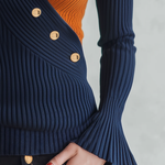 Retro-chic Knit Top Featuring A Blue And Orange Color-block Design