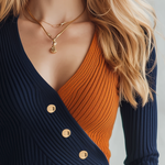 Retro-chic Knit Top Featuring A Blue And Orange Color-block Design