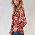 Women's pink leopard-print satin long-sleeve shirt featuring a ruffled front and ruffled cuffs