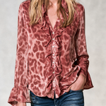 Women's pink leopard-print satin long-sleeve shirt featuring a ruffled front and ruffled cuffs