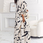 Women's 2 Piece Abstract Print Outfits V-Neck High Slit Longline Top and Wide Leg Pants Set Casual Loose Vacation Set