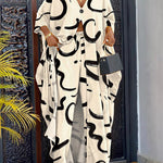 Women's 2 Piece Abstract Print Outfits V-Neck High Slit Longline Top and Wide Leg Pants Set Casual Loose Vacation Set