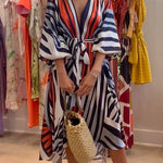 Margovil V Neck Lantern Sleeve Tie Waist Printed Irregular Swing Dress