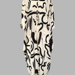 Women's 2 Piece Abstract Print Outfits V-Neck High Slit Longline Top and Wide Leg Pants Set Casual Loose Vacation Set