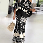 2 Pieces Outfit Skew Neck Lantern Sleeve Loose Fit Top and High Waist Elastic Waist Fishtail Maxi Skirt Set Casual Tropical Print Vacation Set