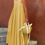 Loose Sleeveless Pleated Solid Color Round-Neck Maxi Dresses