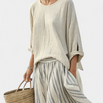 Crisanta | Comfortable blouse and striped midi skirt