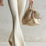 Elegant And Sporty Leopard Print Trim Off-white Knitted T-shirt And Flared Pants Set
