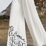 Half Sleeves High Waisted Flower Print Pleated Pockets Deep V-Neck Jumpsuits