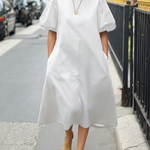 A-Line Loose Pleated Pockets Solid Color Round-Neck Midi Dresses