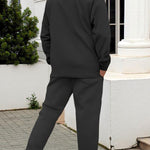 KZZ Men's two-piece casual suit with a stand-up collar long sleeves with a subtle texture