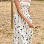 Black Bow Print Smocked Ruffle High Waist Maxi Dress