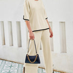 Nadorine Contrasting Color Slit Short-sleeved Sweater Wide-leg Trousers Two-piece Set