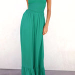 Solid color halter neck open back flared jumpsuit