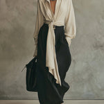 Beige lace-up shirt and black trousers set
