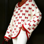 Nadorine All-Over Bow Tie Pattern Knit Sweater