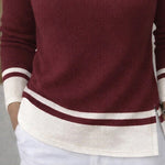 Nadorine Asymmetrical Hem Two-Tone Turtleneck Knit Top