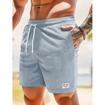 KZZ Men's Letter Patchwork Print Pocket Shorts