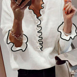 Nadorine Contrast Color Ruffled Trim V-Neck Knit Top