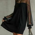 Karen | Short black dress with transparent mesh sleeves and high collar
