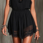 Flaminia | Black pleated playsuit with V-neck and lace edges