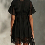 Arabella | Black mini dress with front zip, lace, and ruffled sleeves