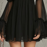 Rosalba | Mini black transparent dress with high collar and floral appliqués