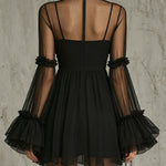 Rosalba | Mini black transparent dress with high collar and floral appliqués