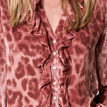 Women's pink leopard-print satin long-sleeve shirt featuring a ruffled front and ruffled cuffs