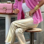 Retro straight-leg gold trousers with loose pockets and wide legs