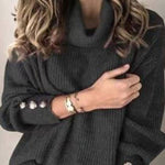 High-neck button-decorated loose knit sweater