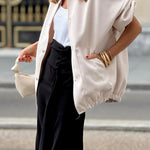 Solid color women's coat with stand collar and large pockets