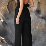 Fashion casual collarless straight wide leg open back cross strap jumpsuit
