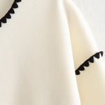 Nadorine Buttoned Crew Neck Loose Color Block Knitted Jacket