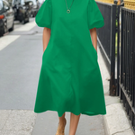 A-Line Loose Pleated Pockets Solid Color Round-Neck Midi Dresses