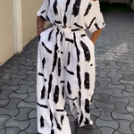 Half Sleeves Loose Printed Striped Tied Waist One-Shoulder Jumpsuits