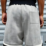 KZZ Men's casual loose striped shorts