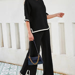 Nadorine Contrasting Color Slit Short-sleeved Sweater Wide-leg Trousers Two-piece Set