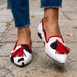 Ginevra Moccasin — Black and White Cow Print, Red Tassels